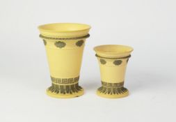 GRADUATED PAIR OF NINETEENTH CENTURY WEDGWOOD YELLOW JASPERWARE VASES, each of tapering form with