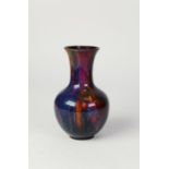 ROYAL DOULTON ?SUNG? FLAMBE GLAZED POTTERY VASE, of footed baluster form with tall, slightly waisted