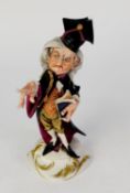 MODERN CAPODIMONTE PAINTED BISQUE PORCELAIN CARICATURE FIGURE OF A BARRISTER, modelled with finger