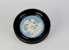 NINETEENTH CENTURY WEDGWOOD BLUE JASPERWARE POTTERY CIRCULAR PLAQUE, applied in white in high relief