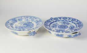 TWO NINETEENTH CENTURY SPODE BLUE AND WHITE POTTERY WARMING PLATES, one in ?THE FOX AND THE LION,