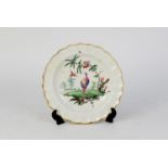 RARE FIRST PERIOD WORCESTER PORCELAIN PLATE, with wavy broad border, the centre painted in