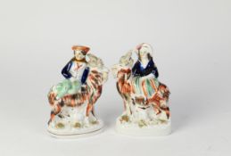 PAIR OF NINETEENTH CENTURY STAFFORDSHIRE FLAT BACK POTTERY GROUPS, each painted in colours and