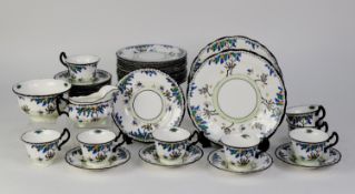 ROYAL DOULTON, CIRCA 1930s CHINA TEA SERVICE printed and painted design of stylised trees in a