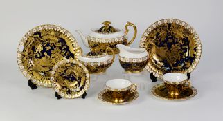 ROYAL CROWN DERBY 'RED AVRES HERALDIC' PATTERN PART TEA SET, gilt on Royal blue comprising; oval