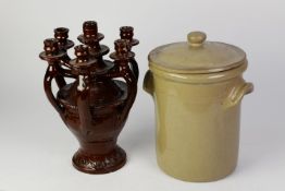 BROWN GLAZED EARTHENWARE SEVEN LIGHT POTTERY CANDELABRUM, of vase form with handle shaped candle