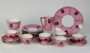 VIENNA 19th CENTURY PORCELAIN TEA SERVICE, pink with gilt radiating bands and borders, the three