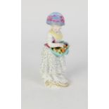 MEISSEN 19th CENTURY PORCELAIN FRUIT PICKER GIRL, with an apron full of fruit, barefoot, on the