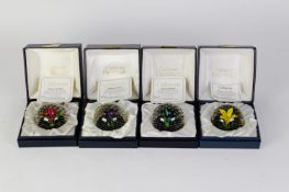 FOUR BOXED CAITHNESS SCOTLAND STUDIO GLASS PAPERWEIGHTS, each in hinge top fitted box, Flower in the