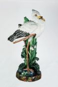 PROBABLY MINTON, STORK PAINTED MOULDED MAJOLICA POTTERY STICK STAND, modelled standing on one leg in