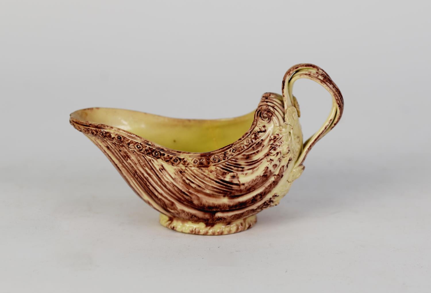 18th CENTURY WHIELDON POTTERY SHELL MOULDED SAUCE BOAT, with cream and brown glaze, diaper