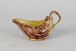 18th CENTURY WHIELDON POTTERY SHELL MOULDED SAUCE BOAT, with cream and brown glaze, diaper