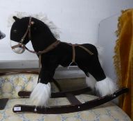 A SMALL CHILD'S ROCKING HORSE, STUFFED HORSE ON WOODEN BASE