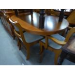 A YEW-WOOD DINING ROOM SUITE, COMPRISING; AN OVAL EXTENDING DINING TABLE, SIX CHAIRS (4 + 2) AND A