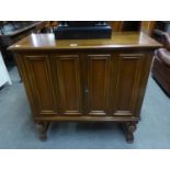 MAHOGANY TELEVISION CABINET WITH BI-FOLD DOORS, ON BALUSTER LEGS, 2?11? (89CM) WIDE (as found)