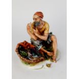 MODERN CAPODIMONTE PAINTED BISQUE PORCELAIN FIGURE OF A FISHERMAN, modelled seated, smoking a