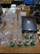 A SET OF EIGHT CUT GLASS CHAMPAGNE FLUTES, SIX CUT GLASS TUMBLERS, A SET OF SIX RUMMERS WITH GREEN