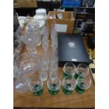 A SET OF EIGHT CUT GLASS CHAMPAGNE FLUTES, SIX CUT GLASS TUMBLERS, A SET OF SIX RUMMERS WITH GREEN