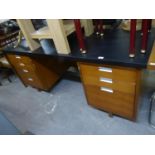 AN EXECUTIVE TEAK DOUBLE PEDESTAL DESK, WITH BLACK LEATHERETTE COVERED TOP, SEVEN DRAWERS, 6? X 3?