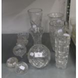 THREE GOOD SIZE CUT GLASS FLOWER VASES, WITH WHORL CUT DECORATION, AN ORBICULAR CUT GLASS VASE,