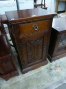 CARVED OAK BEDSIDE CUPBOARD WITH DRAWER ABOVE (OLD CHARM)