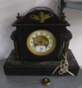 A VICTORIAN BLACK SLATE MANTEL CLOCK