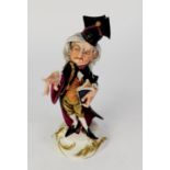 MODERN CAPODIMONTE PAINTED BISQUE PORCELAIN CARICATURE FIGURE OF A BARRISTER, modelled with finger