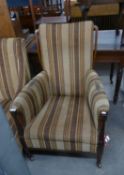 ARTS & CRAFTS LATE VICTORIAN FIRESIDE ARMCHAIR, IN STRIPED FABRIC