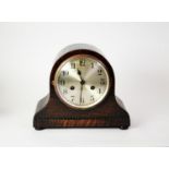 CIRCA 1920's OAK CASED NAPOLEONS HAT SHAPE MANTEL CLOCK WITH MOVEMENT STRIKING ON A COILED GONG