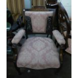 AN EDWARDIAN INLAID OPEN ARMCHAIR, HAVING OVERSTUFFED SEAT COVERED IN PINK FLORAL FABRIC, PART