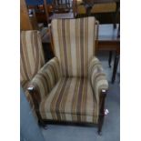 ARTS & CRAFTS LATE VICTORIAN FIRESIDE ARMCHAIR, IN STRIPED FABRIC