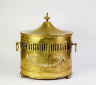 EDWARDIAN OVAL BRASS TWO HANDLED LIDDED LOG/COAL BIN, APPLIED WITH A BOWED RIBBON SUSPENDED HUSK