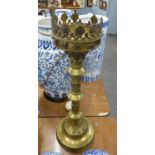 ARTS AND CRAFTS LARGE BRASS CANDLESTICK, THE CIRCULAR PRICKET TOP WITH GALLERY OF RAISED LEAVES,