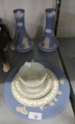 A PAIR OF WEDGWOOD PALE BLUE AND WHITE JASPER WARE LONG-NECKED VASES, A PLAQUE AND A WEDGWOOD