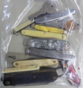 A SMOKER'S STEEL PENKNIFE, TOOLS AND DAMPER COMBINED AND 11 OTHER POCKET KNIVES