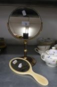 A LADY'S EDWARDIAN BONE-BACKED DRESSING TABLE HAND MIRROR AND A MODERN CIRCULAR PEDESTAL MAKE-UP