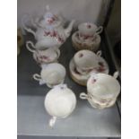 A ROYAL ALBERT ?LAVENDER ROSE? TEA SERVICE FOR SIX PERSONS, 21 PIECES, PRINTED WITH ROSES,