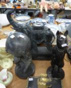 LARGE BLACK FINISH COMPOSITION FIGURE OF AN  ELEPHANT AND HOWDAH DEPICTED TRUNK RAISED, 15" (38cm)