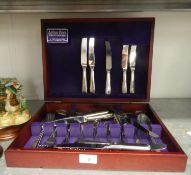 BOXED SET OF ARTHUR PRICE INTERNATIONAL POLISHED STAINLESS STEEL CUTLERY FOR SIX SETTINGS