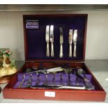 BOXED SET OF ARTHUR PRICE INTERNATIONAL POLISHED STAINLESS STEEL CUTLERY FOR SIX SETTINGS