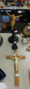 AN EBONY AND IVORINE CRUCIFIX AND TWO OTHERS (3)