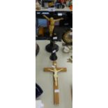 AN EBONY AND IVORINE CRUCIFIX AND TWO OTHERS (3)