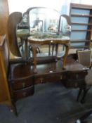 A 1930's KNEEHOLE DRESSING TABLE WITH FRAMELESS TRIPLE DRESSING MIRRORS, ON CABRIOLE LEGS AND A