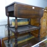 AN OAK PEMBROKE STYLE TWO TIER TEA TROLLEY