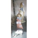 TWO NAO, SPANISH PORCELAIN FIGURES OF A GIRL WITH A DOLL AND A SMALL CLOWN FIGURE, ALSO A CHINA