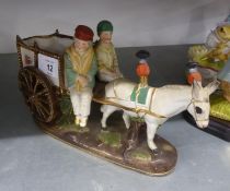 A CONTINENTAL PORCELAIN DONKEY CART WITH TWO RIDERS