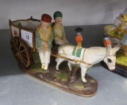 A CONTINENTAL PORCELAIN DONKEY CART WITH TWO RIDERS