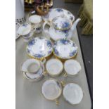 A ROYAL ALBERT 'BLUE ROSE' TEA SERVICE, ORIGINALLY FOR EIGHT PERSONS (LACKS 2 SIDE PLATES), WITH