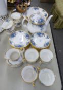 A ROYAL ALBERT 'BLUE ROSE' TEA SERVICE, ORIGINALLY FOR EIGHT PERSONS (LACKS 2 SIDE PLATES), WITH