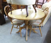 A LIGHT OAK CIRCULAR TRIPOD BREAKFAST TABLE AND A PAIR OF ERCOL  HOOP BACK SINGLE CHAIRS